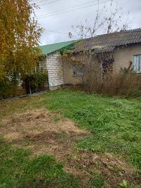 нежилое здание (общежитие) с кадастровым номером 71:08:060305:882 и земельный участок с кадастровым номером 71:08:060305:1085